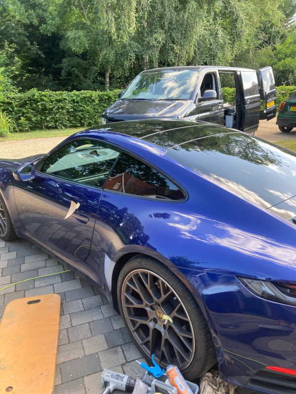 Finished Porsche 911 Gentian Blue paintwork after repair